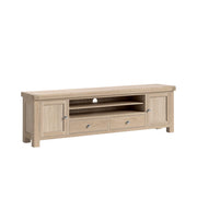 Wooden TV stand with multiple compartments on a white background