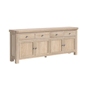 Extra large oak sideboard with 4 drawers and four hinged doors. 