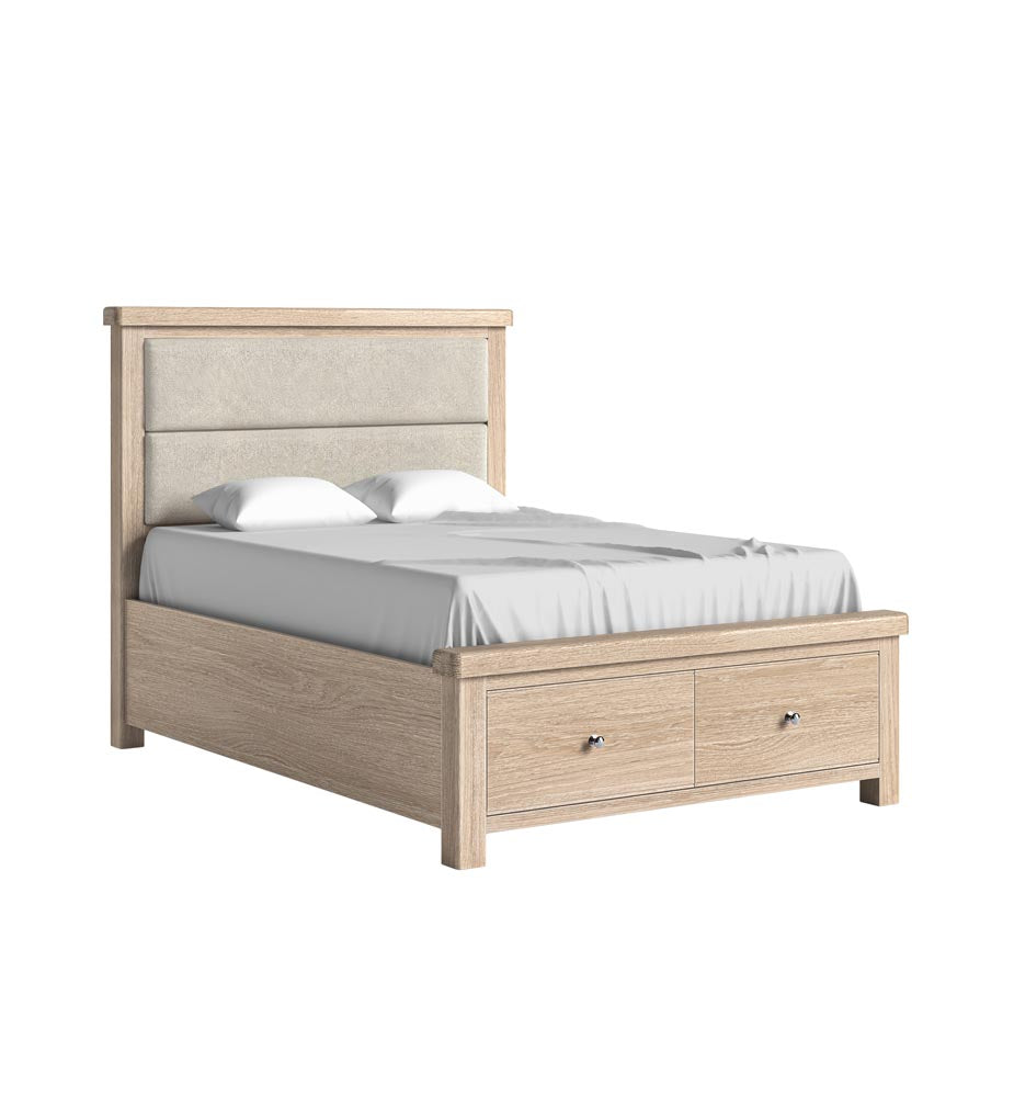 Wooden bed frame with cream fabric headboard, storage drawers on a white background