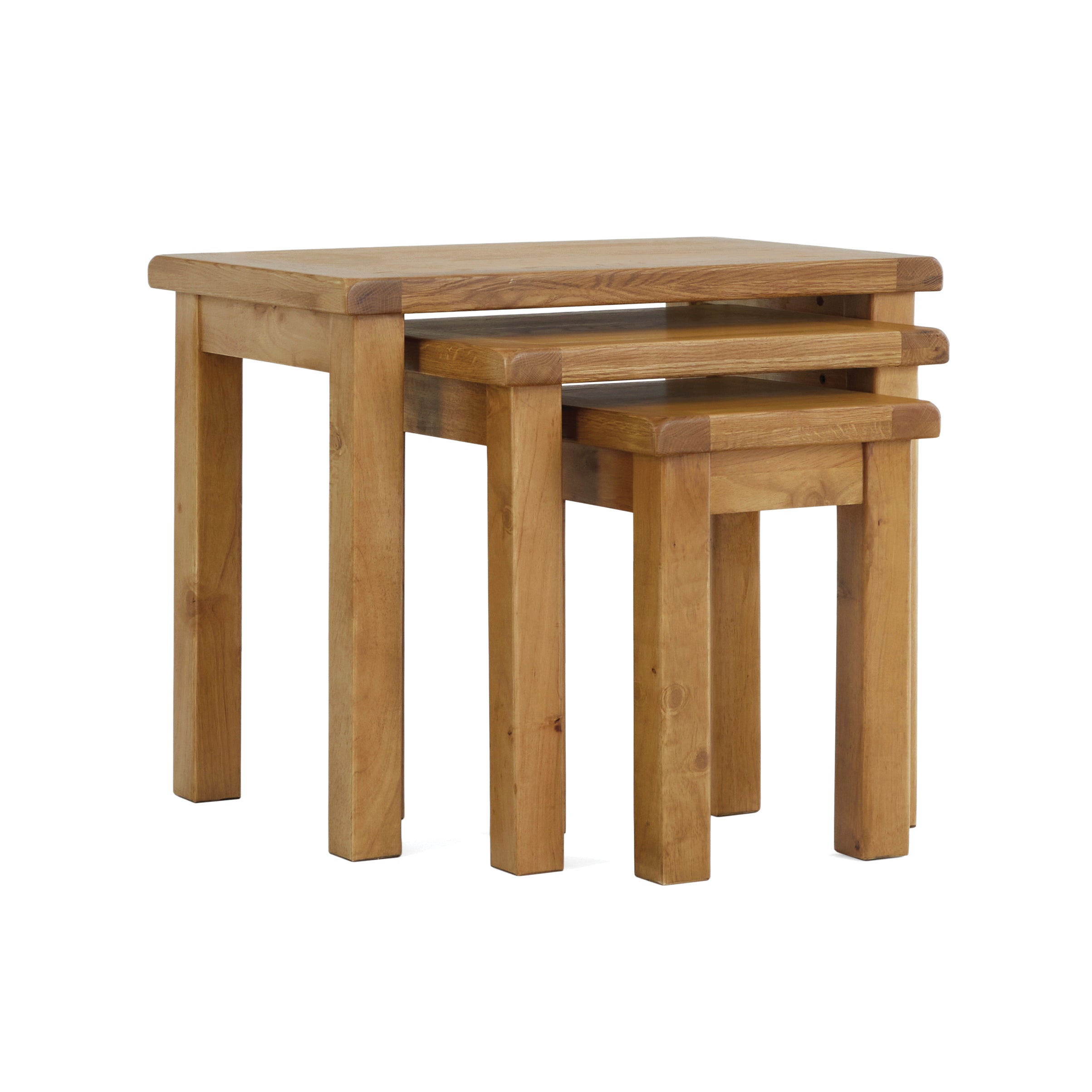 angled image of a nest of 3 oak tables