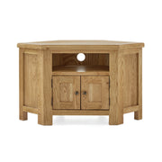 6 sided oak corner tv unit with 4 legs, a centre shelf and 2 small doors beneath revealing enclosed storage
