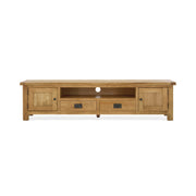 Oak tv unit with centre shelf, two drawers underneath and a cupboard on either side