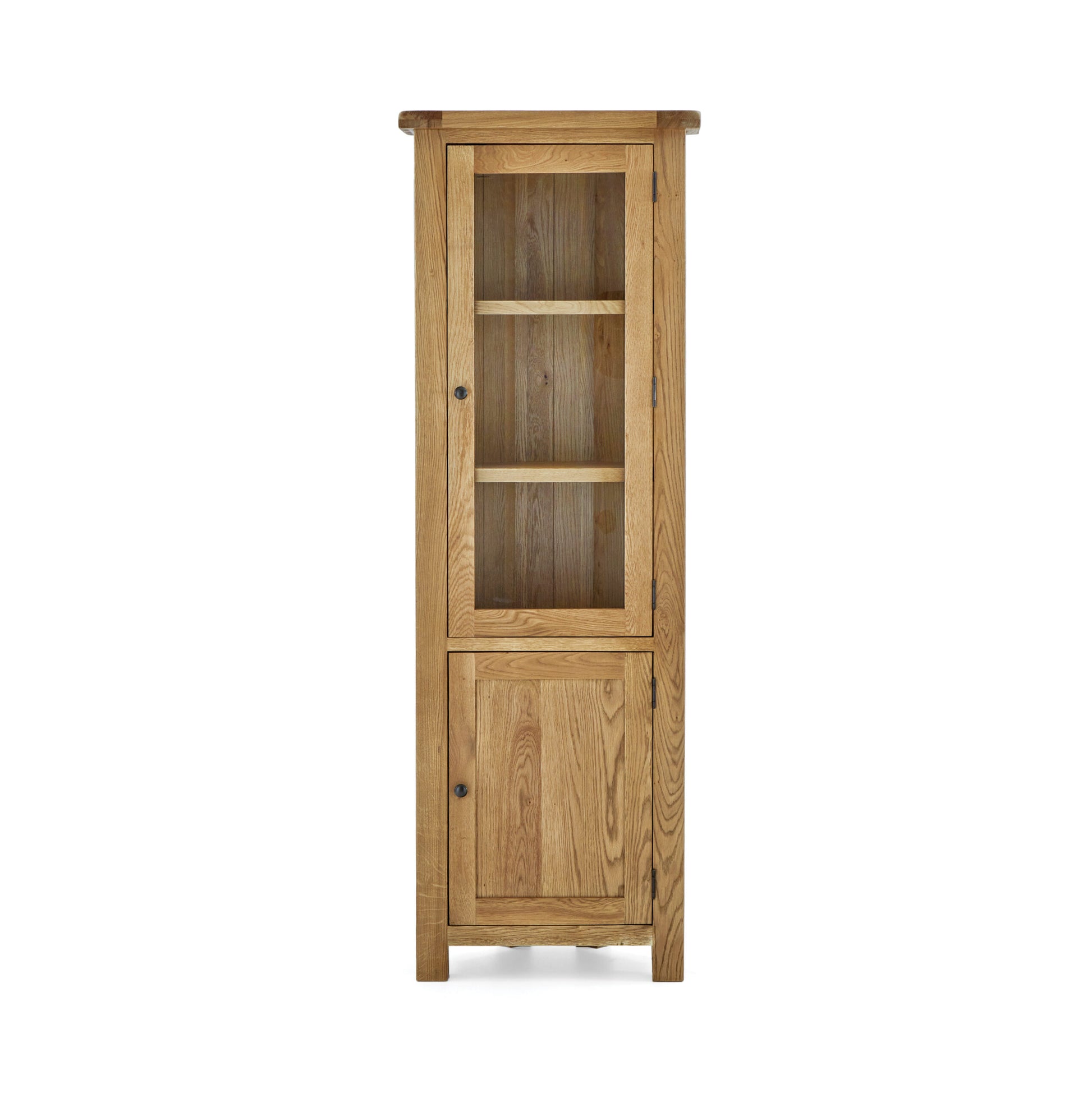 tall oak display cabinet with single glass door, 3 upper shelves and concealed storage underneath behind a single oak door.