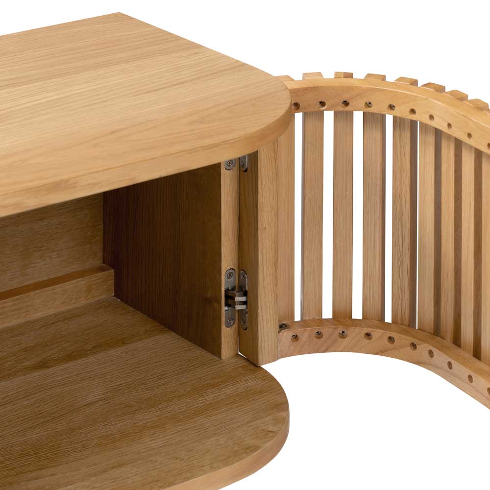 Close up of tv unit door opening up to show storage space and door hinges. 