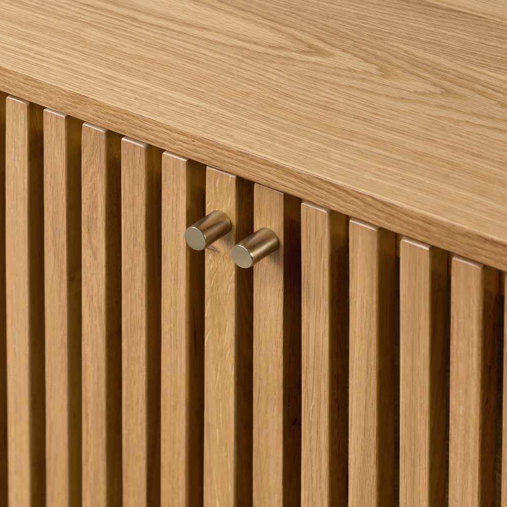 Wooden cabinet with slatted design and metallic handles