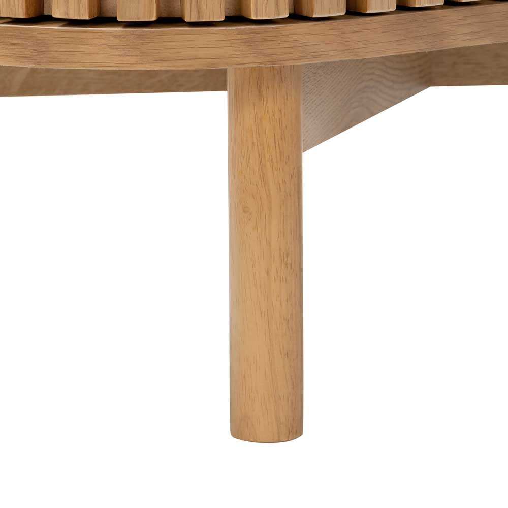 Close-up of a wooden sideboard leg on a white background