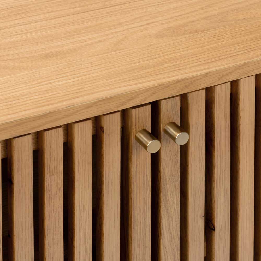 Wooden cabinet with slatted design and gold handles