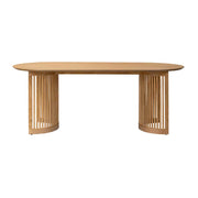 Wooden dining table with a modern slatted design on a white background