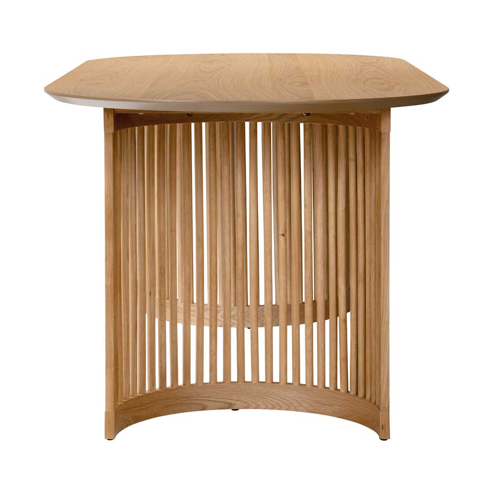 Wooden oval dining table with slatted design on a white background