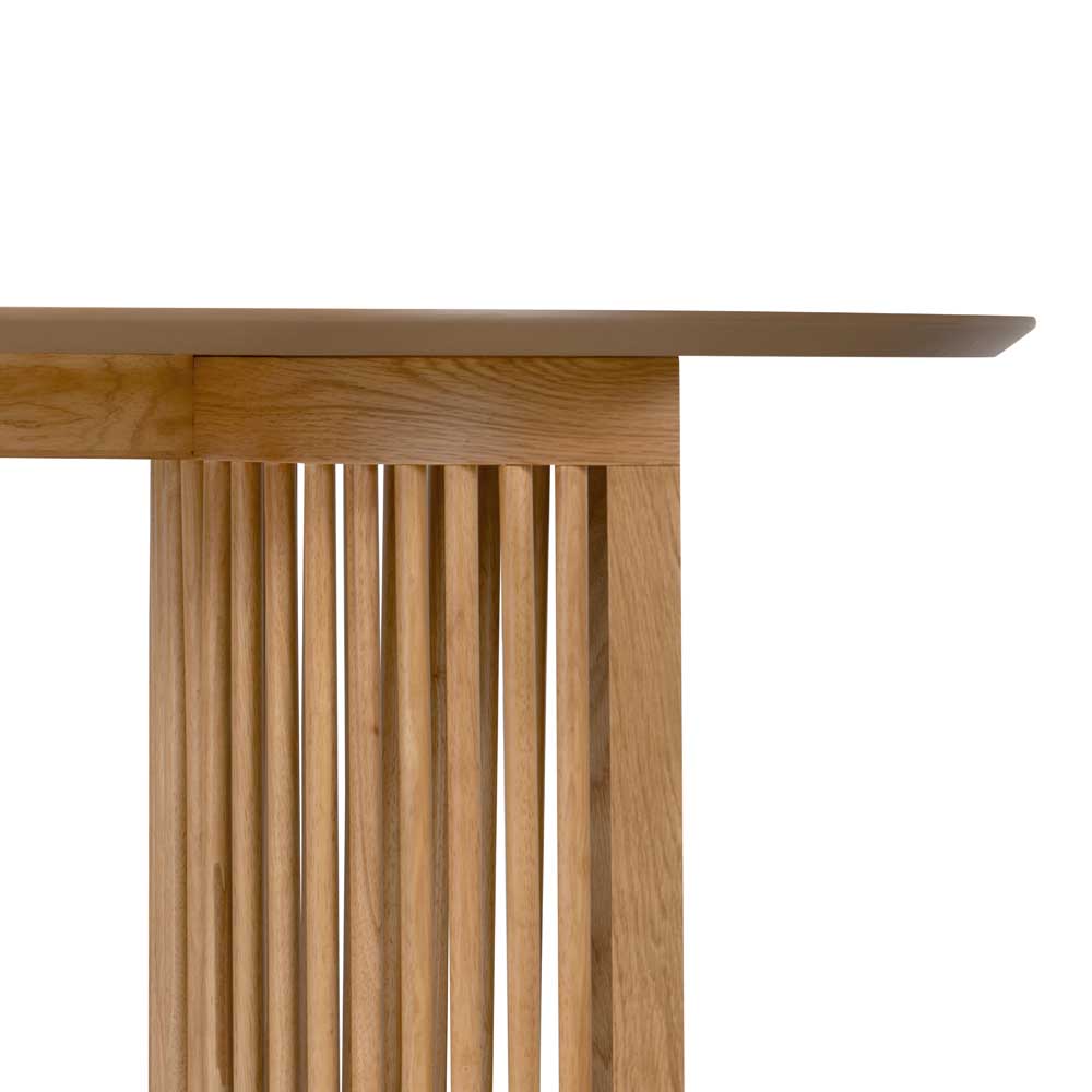 Wooden table with a minimalist slatted design on a white background