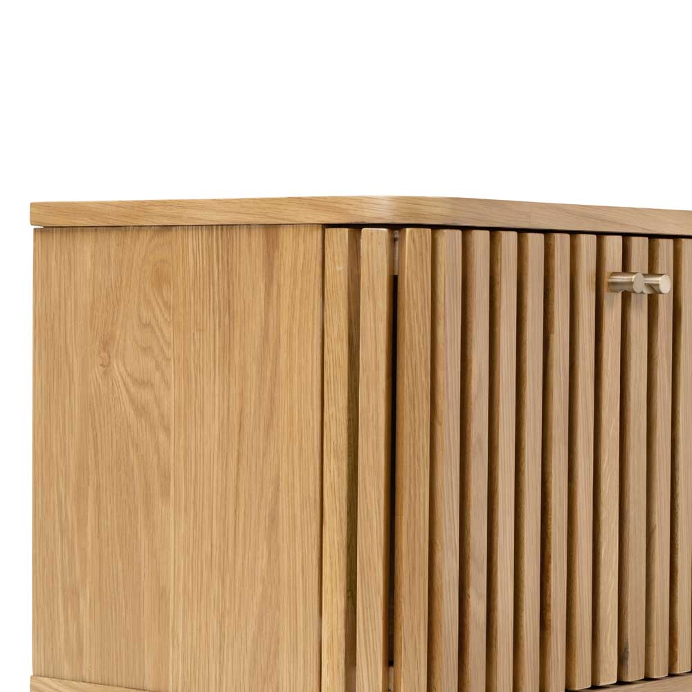 Wooden storage unit with a closed slatted door on a white background