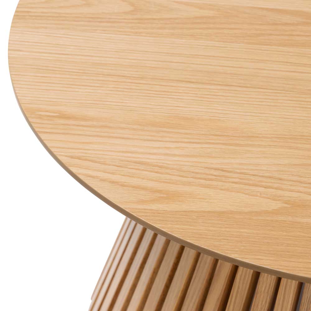 Close-up of a wooden coffee table with a white background