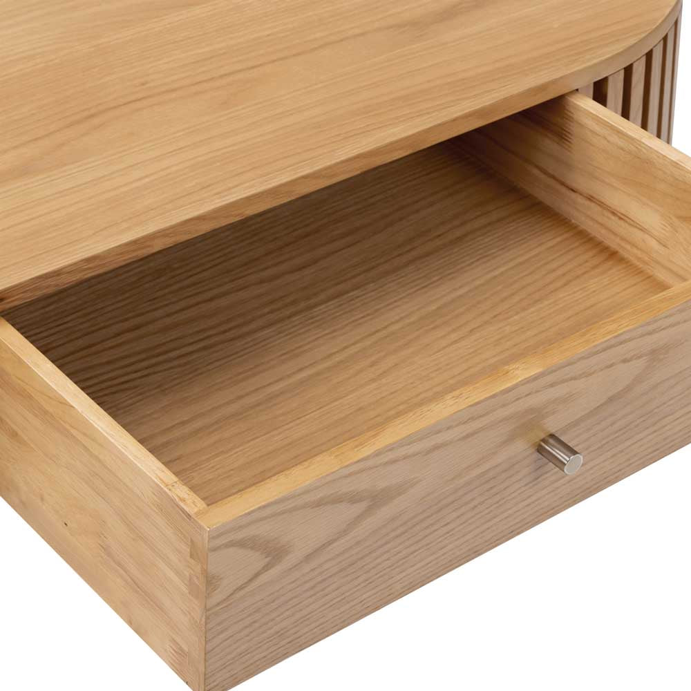 Wooden drawer with a metal (gold effect) handle on a white background