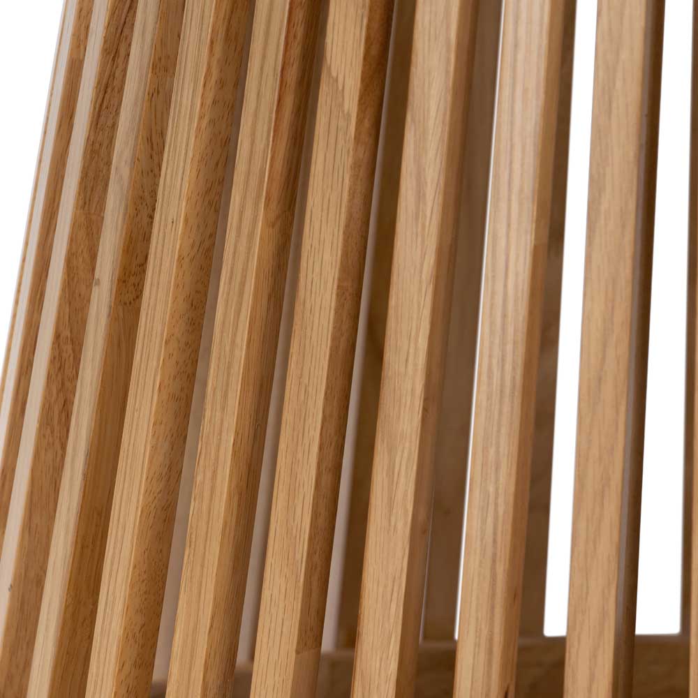 Close-up of wooden slatted tapered able base with a white background
