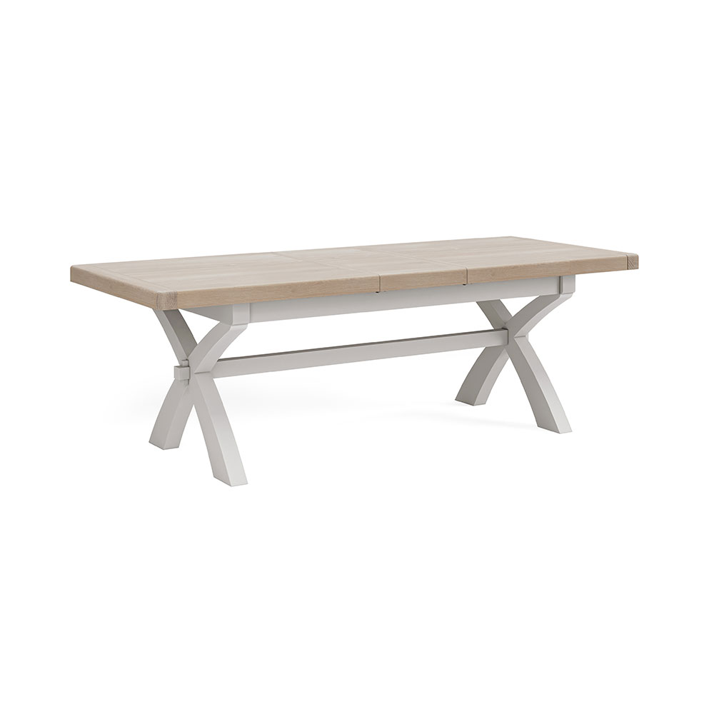 Grey painted oak extending table with X shaped leg design.