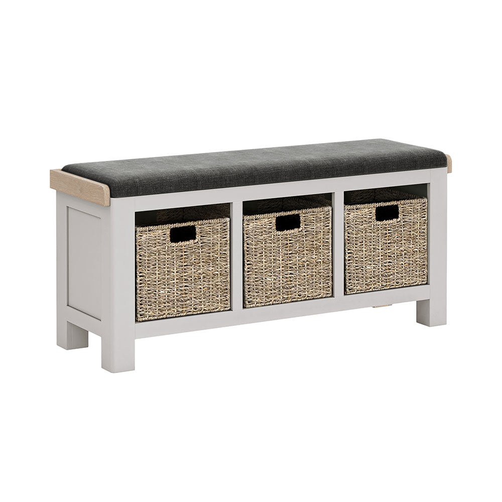 Grey painted oak hallway storage bench with storage baskets under the seat. Charcoal cushion on the bench.