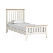 Oak painted slatted signle bedframe, white, with white pillow and matress.