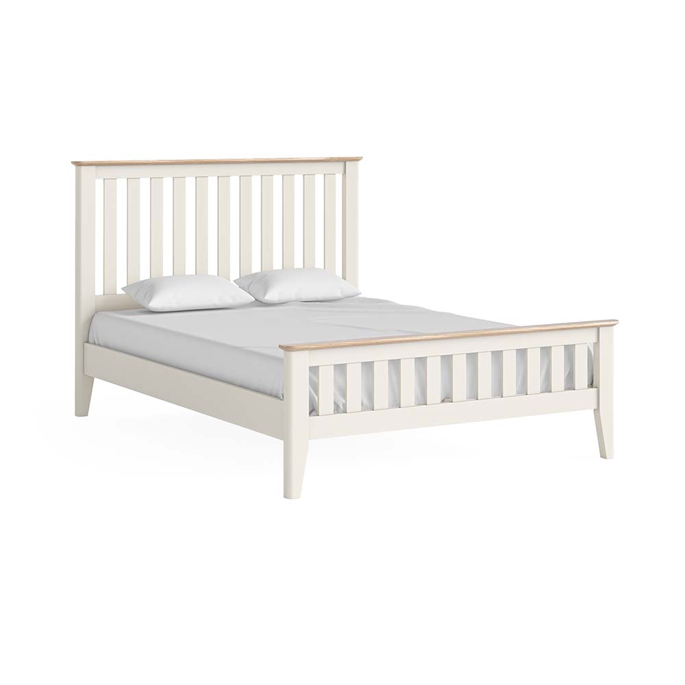 Oak painted slatted double bedframe, white, with white pillow and matress.