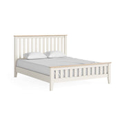 Oak painted slatted king 5ft bedframe, white, with white pillow and matress.