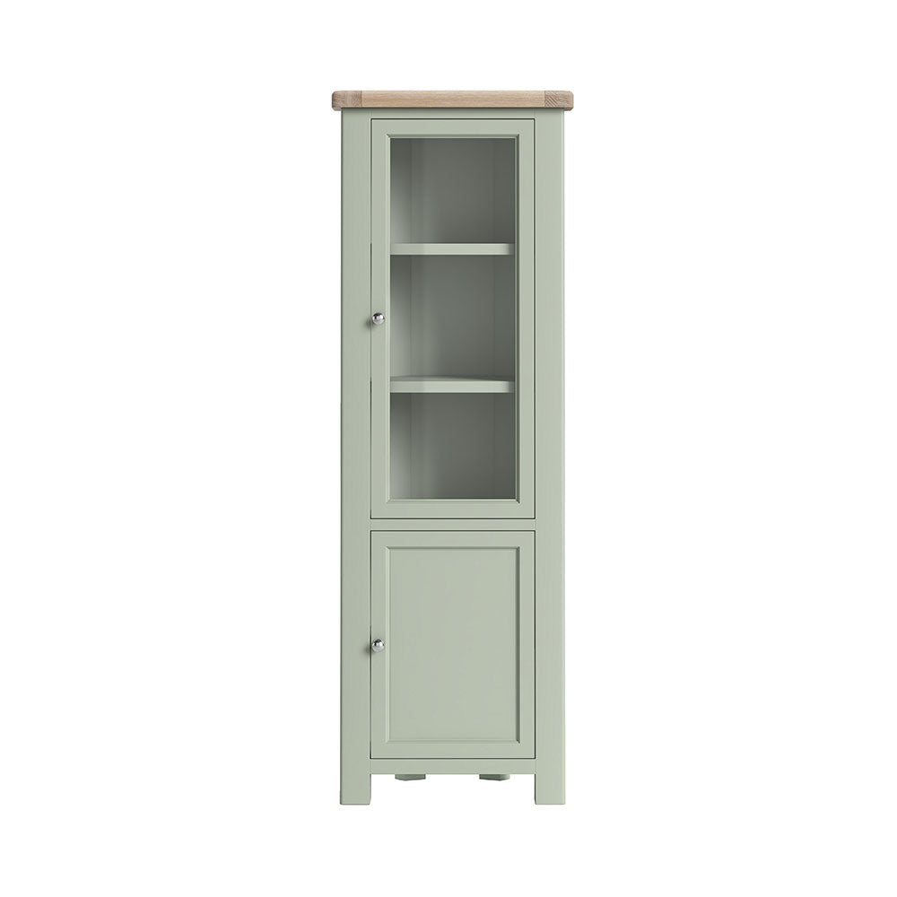 Oak display cabinet, with two doors, the top door has a glass panel, and 3 shelves are visible inside. the bottom door is solid oak and encloses a further 2 shelves. the whole unit is painted sage green, except for the unpainted oak top