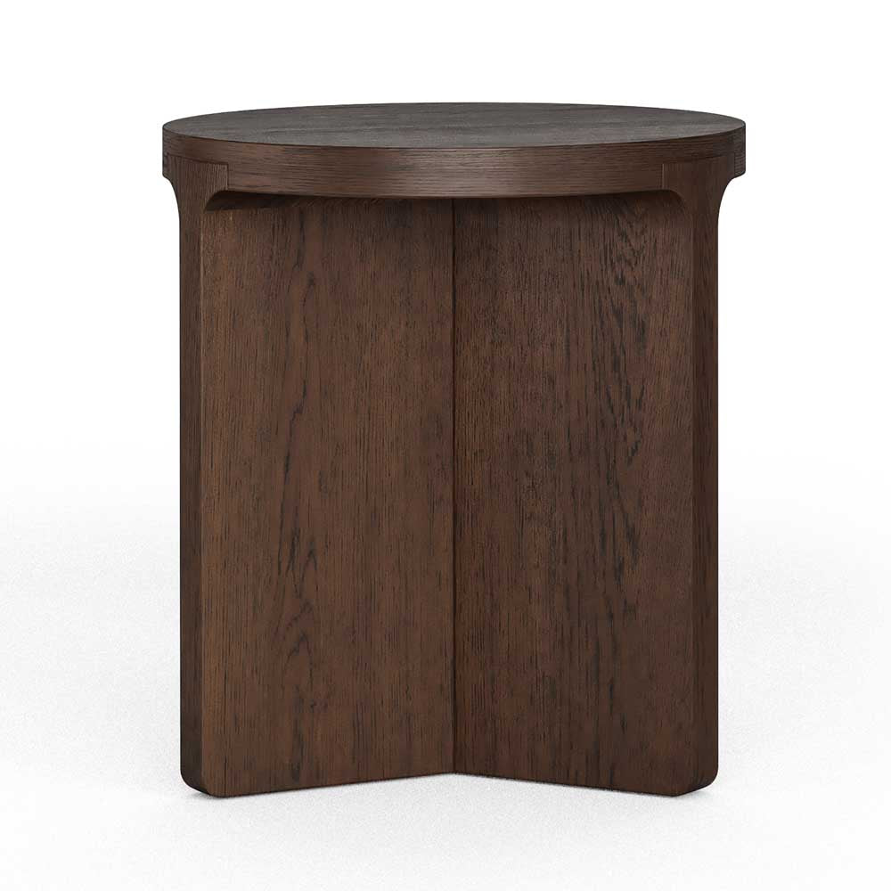 A dark brown wooden side table with a round top and a unique three-panel pedestal base, shown against a plain white background.