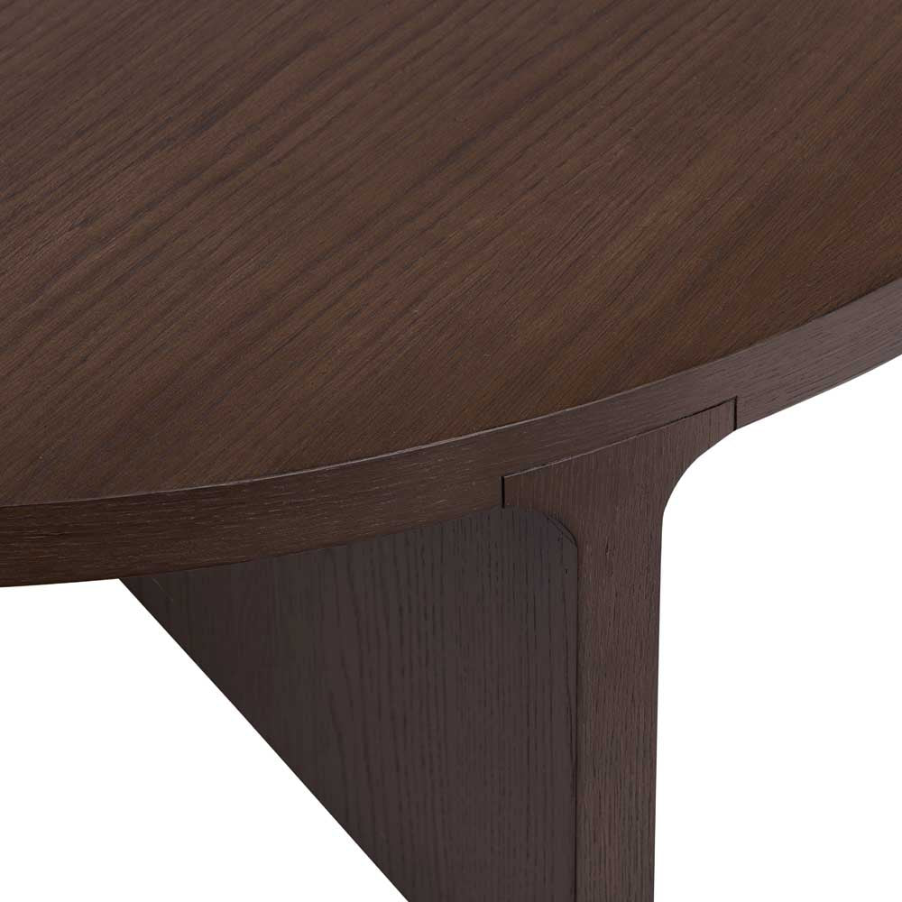 Close-up of a wooden table leg on a white background