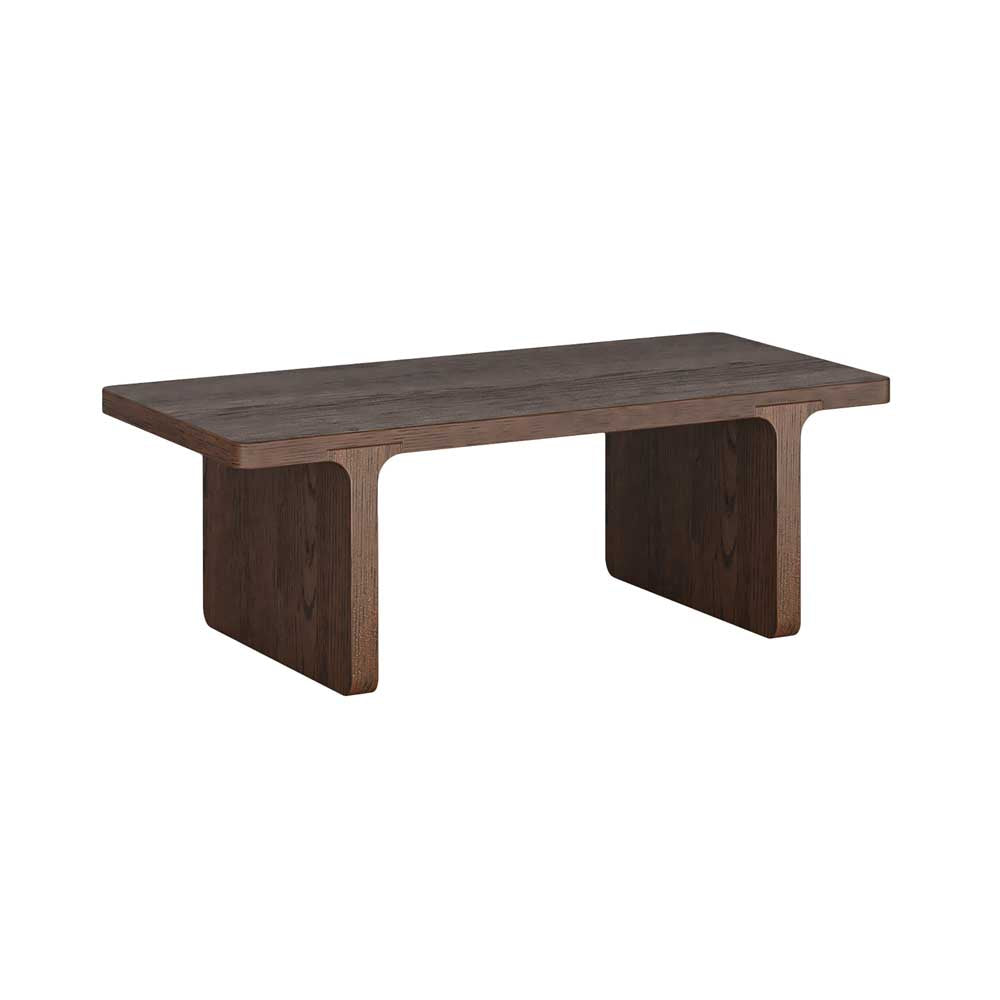 A modern low wooden coffee table sandblasted to give a dark brown finish and integrated legs, shown on a plain white background.