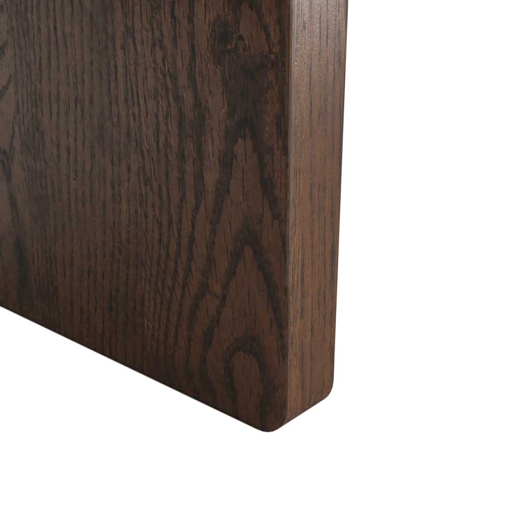 Close-up of a dark brown wood grain leg showing a corner with a rounded bevel, on a white background.