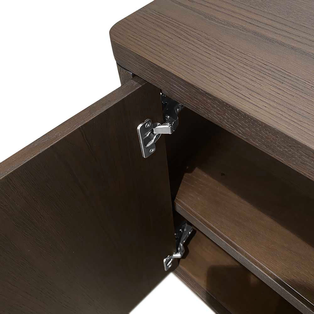 Close-up of a dark brown wooden cabinet with one door open, showing silver metal hinge hardware and the interior shelf.