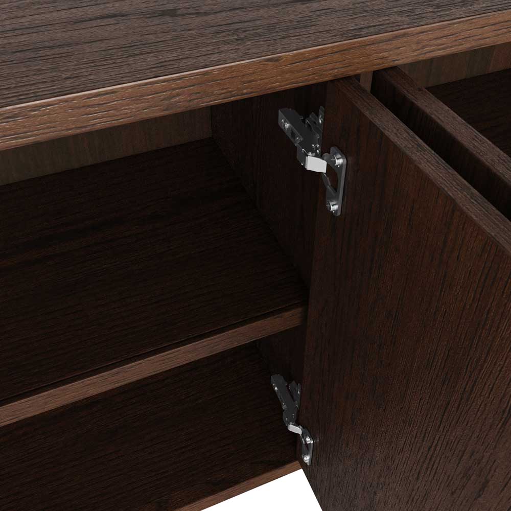 Close-up of a dark brown wooden cabinet with one door open, showing silver metal hinges and interior shelves.