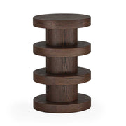 A dark brown wooden side table with a modern stacked circular design, featuring three tiers of round wooden platforms supported by a central column, shown on a plain white background.