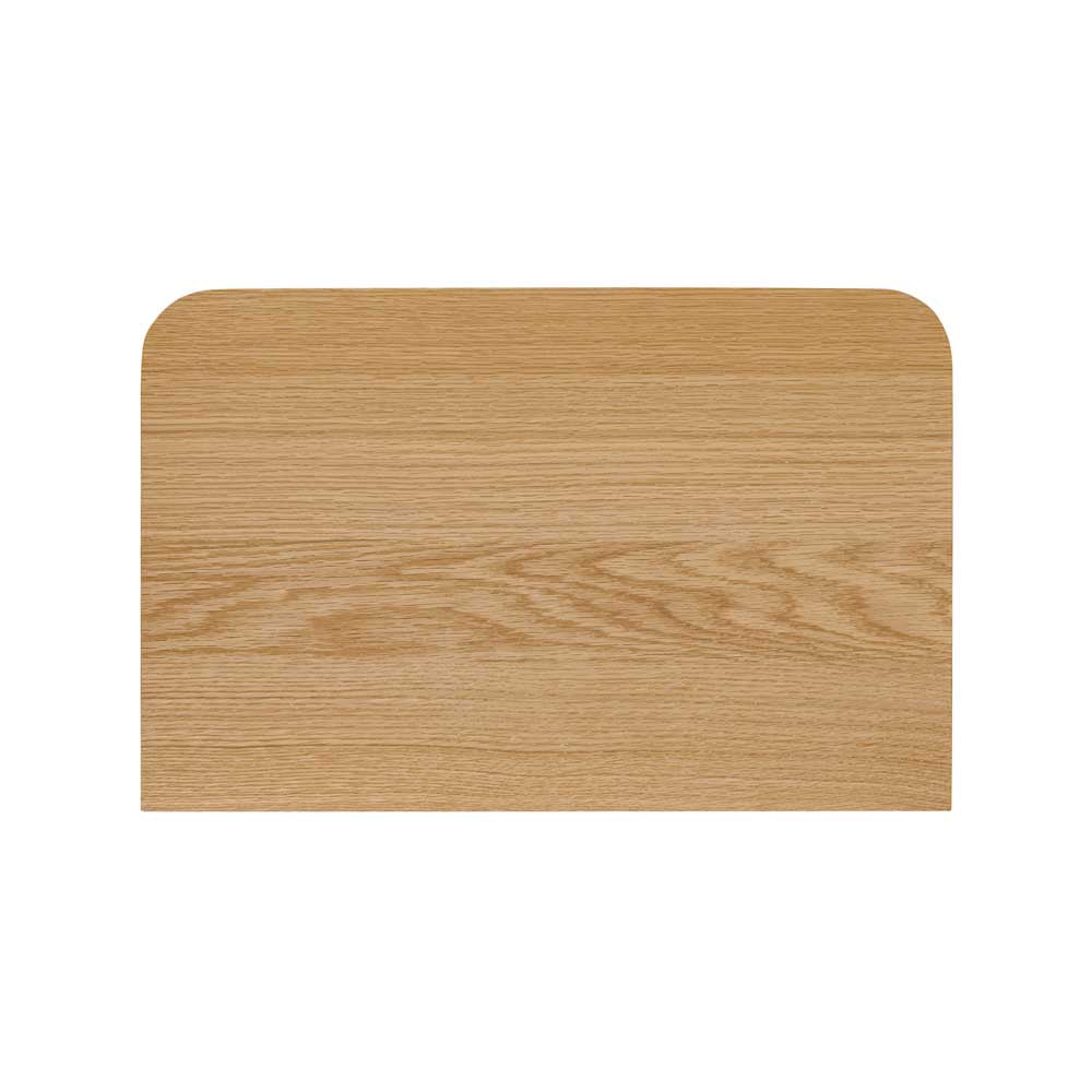 View from above of a wooden chest of drawers on a white background