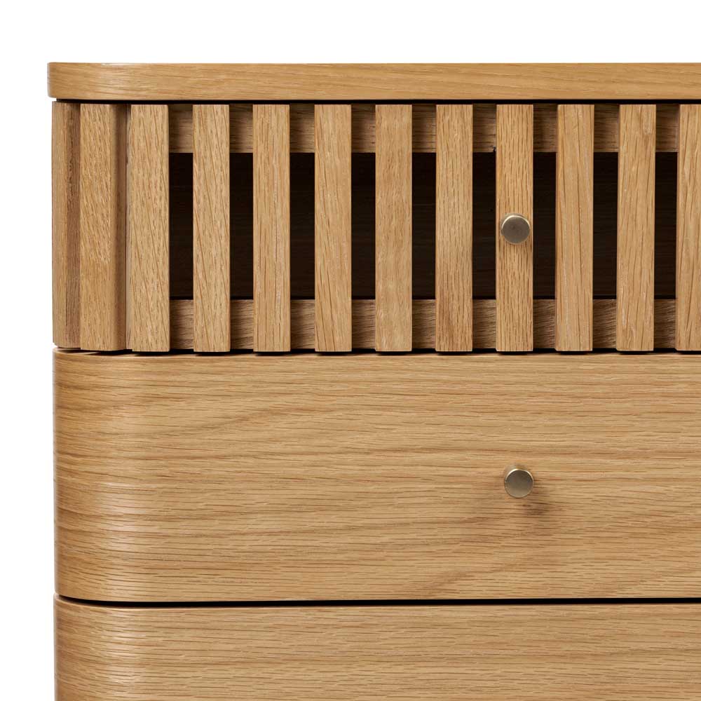Wooden drawer with slatted top on a white background