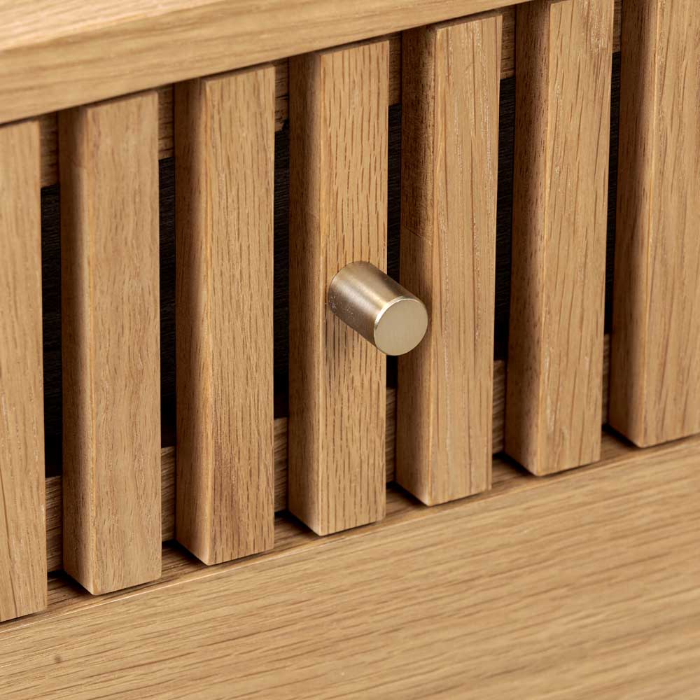 Wooden drawer with a metallic handle