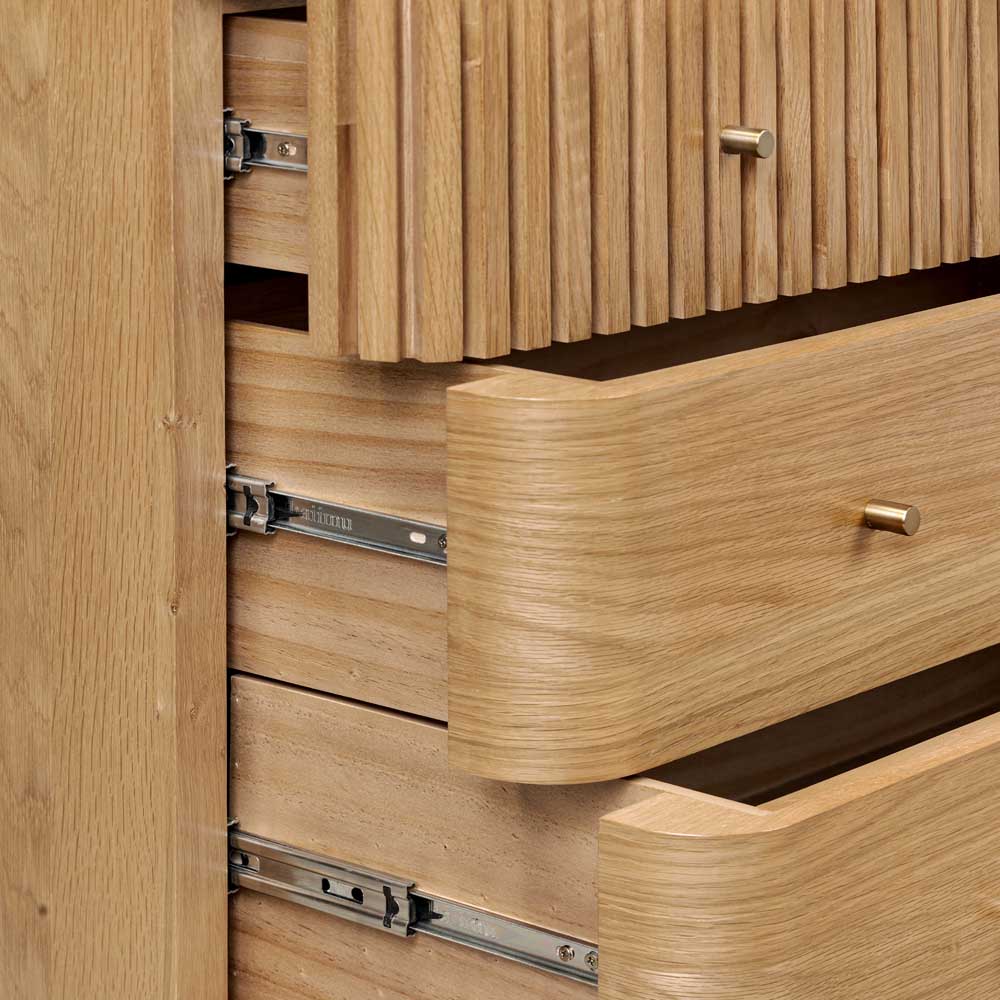 Close-up of a wooden drawer with metal hardware