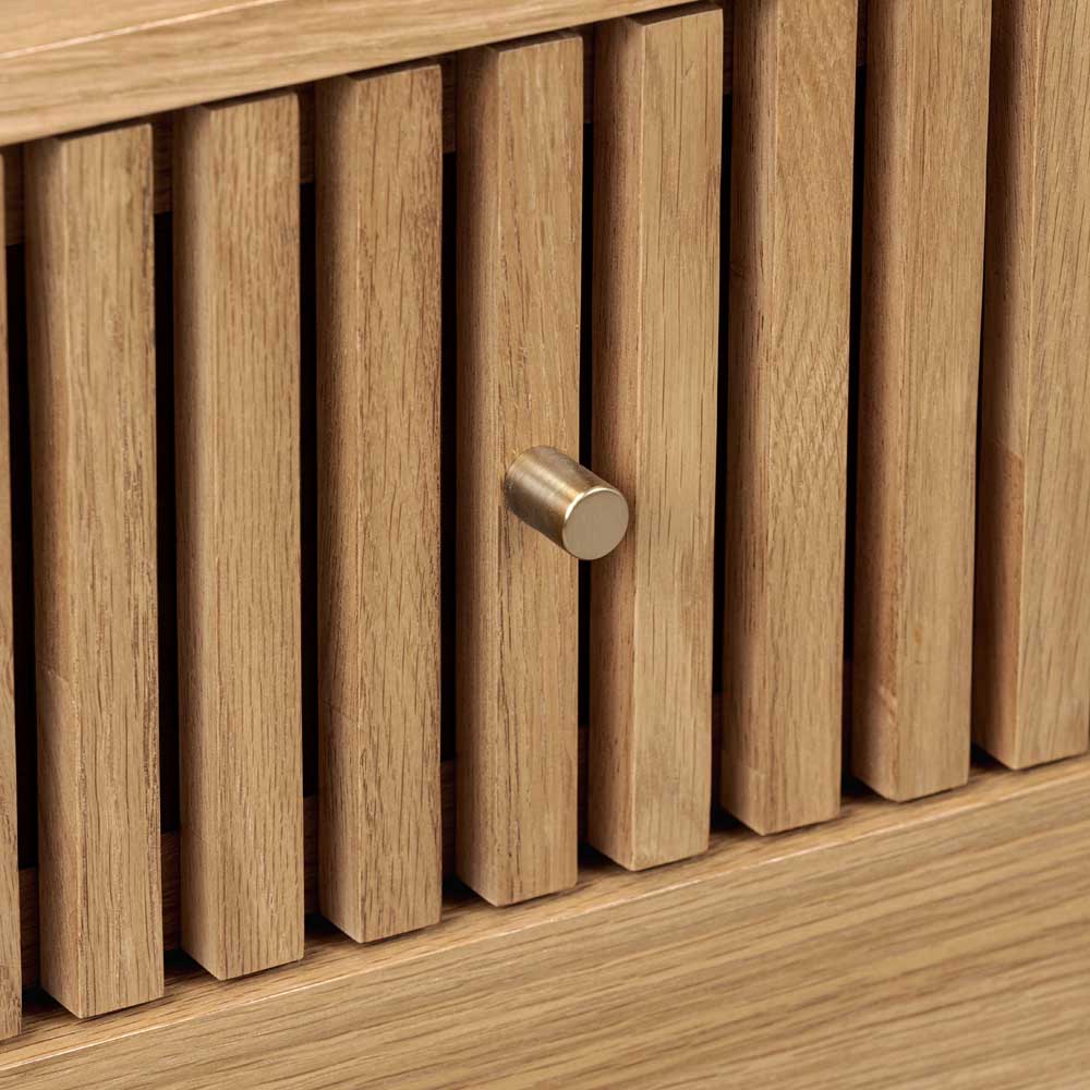 Wooden cabinet with slatted design and metallic handle