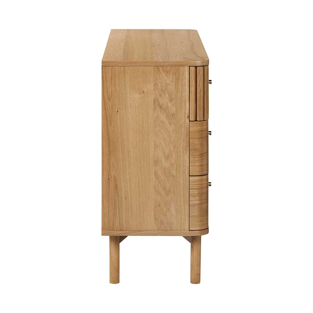 Sie view of a Wooden chest of drawers with a white background