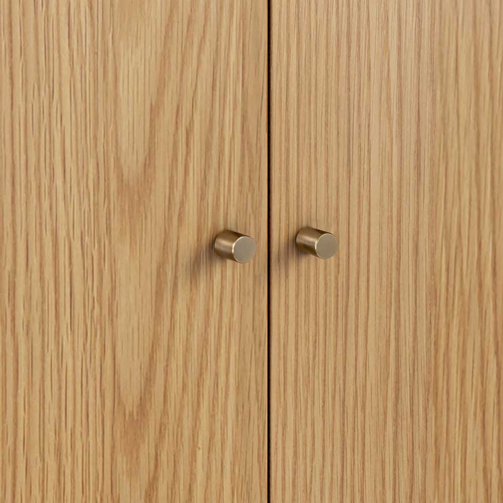 Wooden wardrobe with gold effect handles