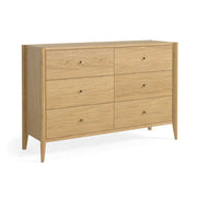 Natural Oak Wooden dresser with six drawers on a white background
