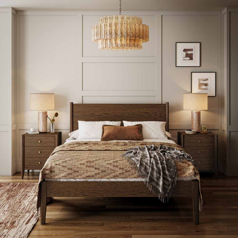 Modern bedroom with brown oak bedframe, nightstands, and lamps.