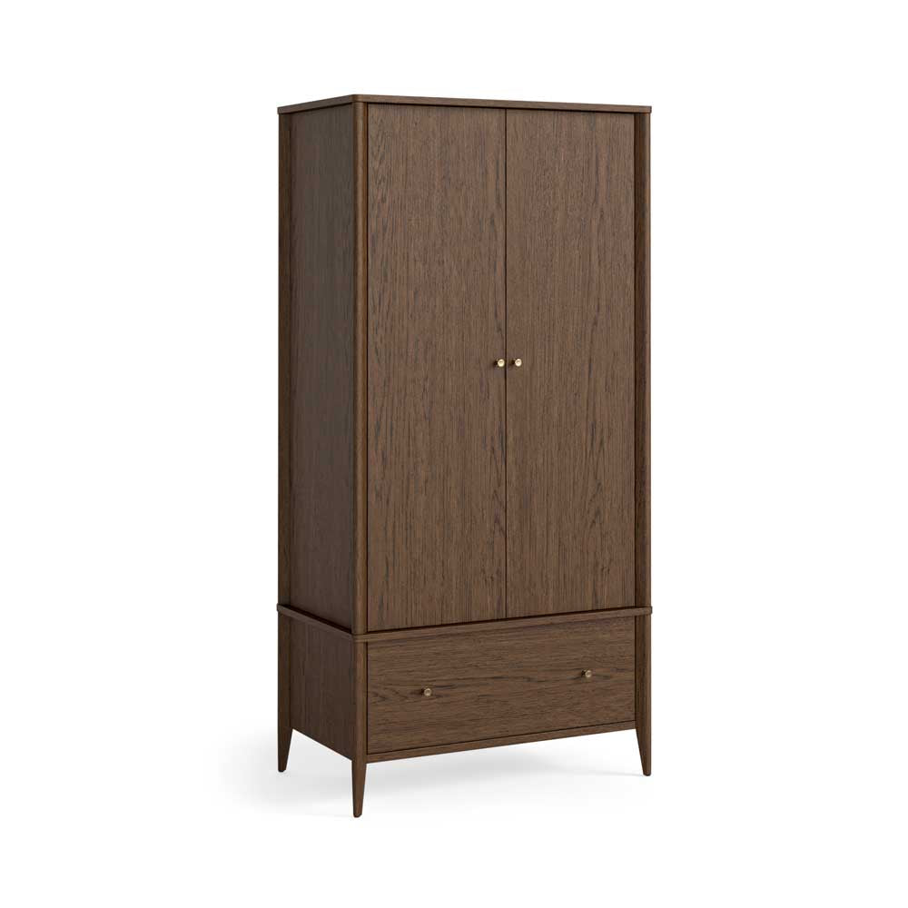 A tall two-door wooden wardrobe with a lower drawer, shown on a clean white background. The cabinet is made of deep brown oak wood with a natural grain and features small round metal knobs.