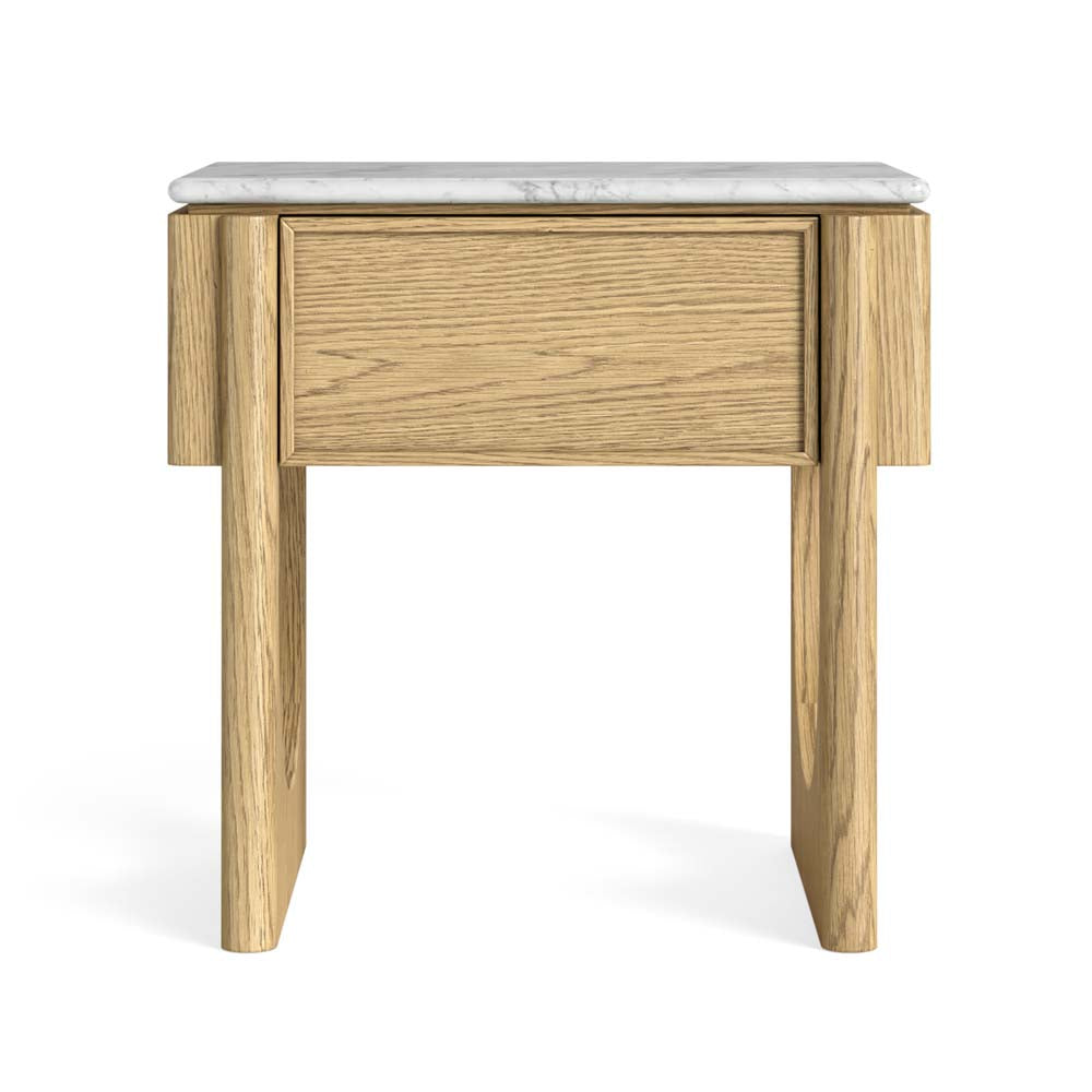 A modern oak nightstand or side table with a single drawer, featuring a light oak wood frame, a white marble top, and beautiful cut out legs, shown on a white background.