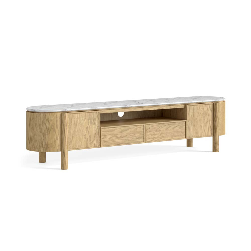 Diagonal view of the Phoenix light oak TV stand with a white marble top, handleless drawers, 2 enclosed cupboards and an open shelf with cable cut-out on a white background