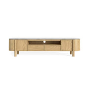 Wooden TV stand with a white marble top, handleless drawers, 2 enclosed cupboards and an open shelf with cable cut-out on a white background