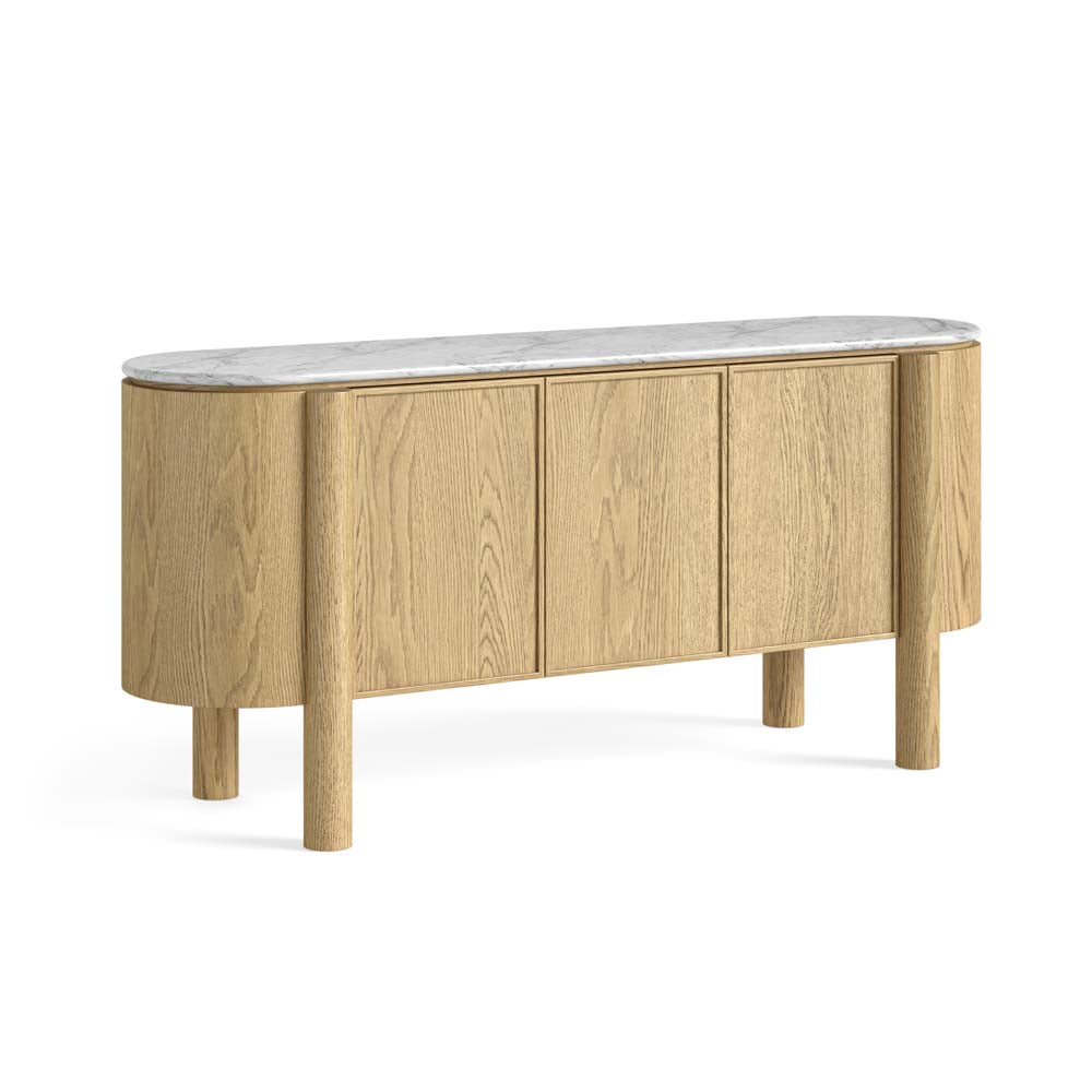 An elegant mid-century modern sideboard featuring a light oak wood cabinet body with a curved, rounded front, supported by four cylindrical legs, and topped with a polished white marble slab.