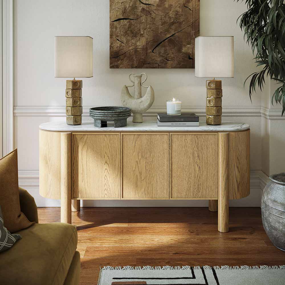 Large Wooden sideboard with marble top in a living room setting