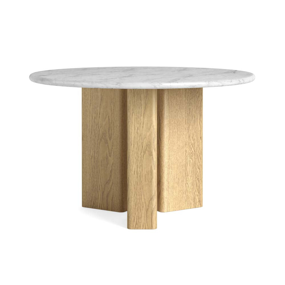 Round dining table with marble top and wooden legs on a white background