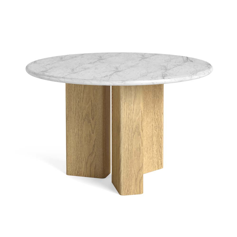 Round dining table with marble top and wooden legs on a white background