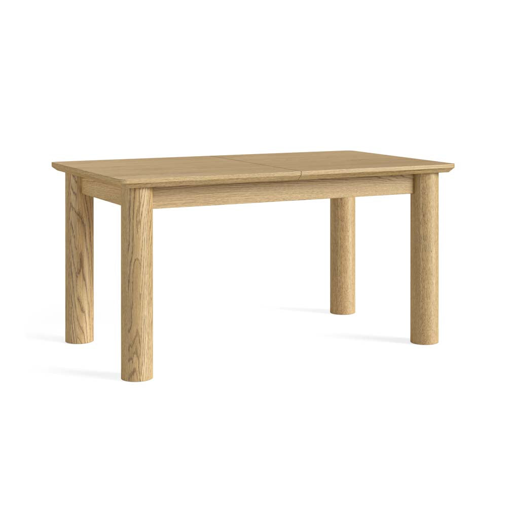 Rectangular light oak dining table with cylindrical legs on a white background