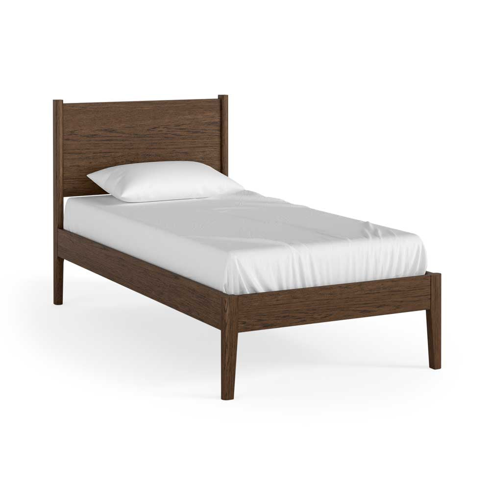 Wooden bed frame with white mattress and pillow on a white background